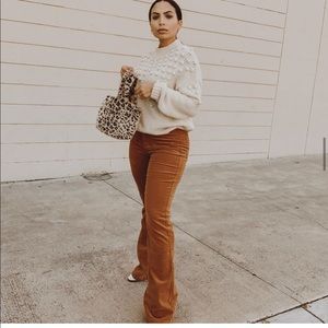 Rust flared velvet pants
